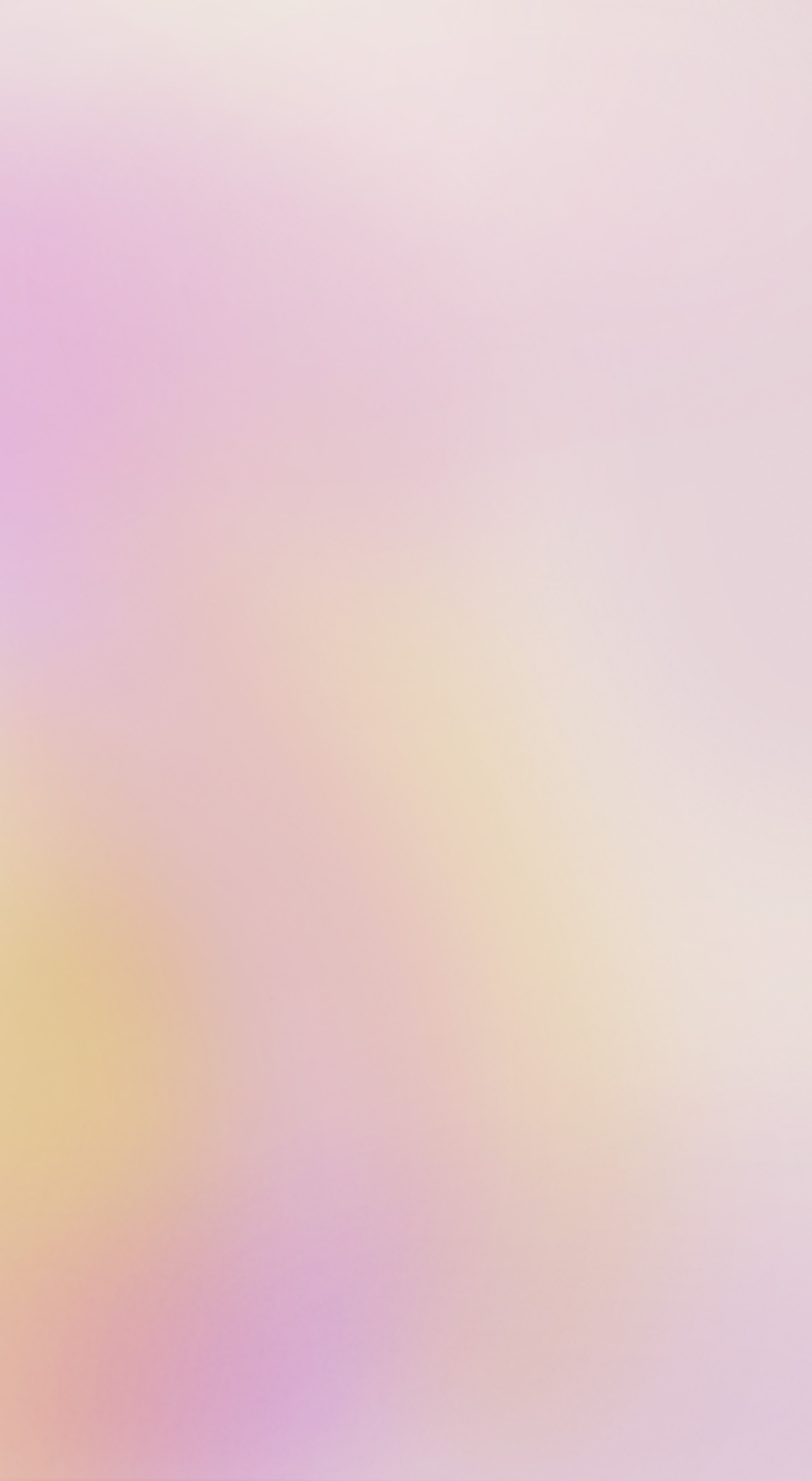 Farverig baggrund i en sart lilla og gul farve, som skaber en aura-effekt